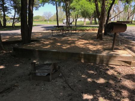 Picnic tables, grill, and fire ring