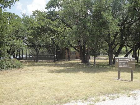 A photo of Site GR-4 of Loop 4 at FLATROCK (TEXAS) with Picnic Table, Electricity Hookup, Shade, Water Hookup, Lean To / Shelter