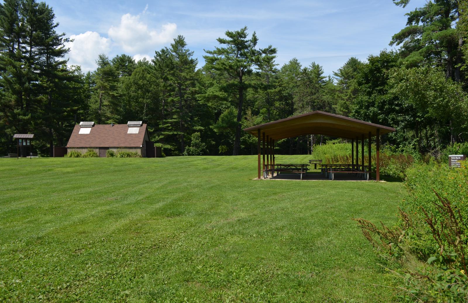 Elm shelter at Otter Brook Lake, with lawn area, and restroom building in backgroundElm shelter at Otter Brook Lake