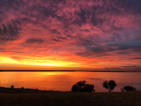 Sunset on Waco LakeOrange hue of sunset at Lake