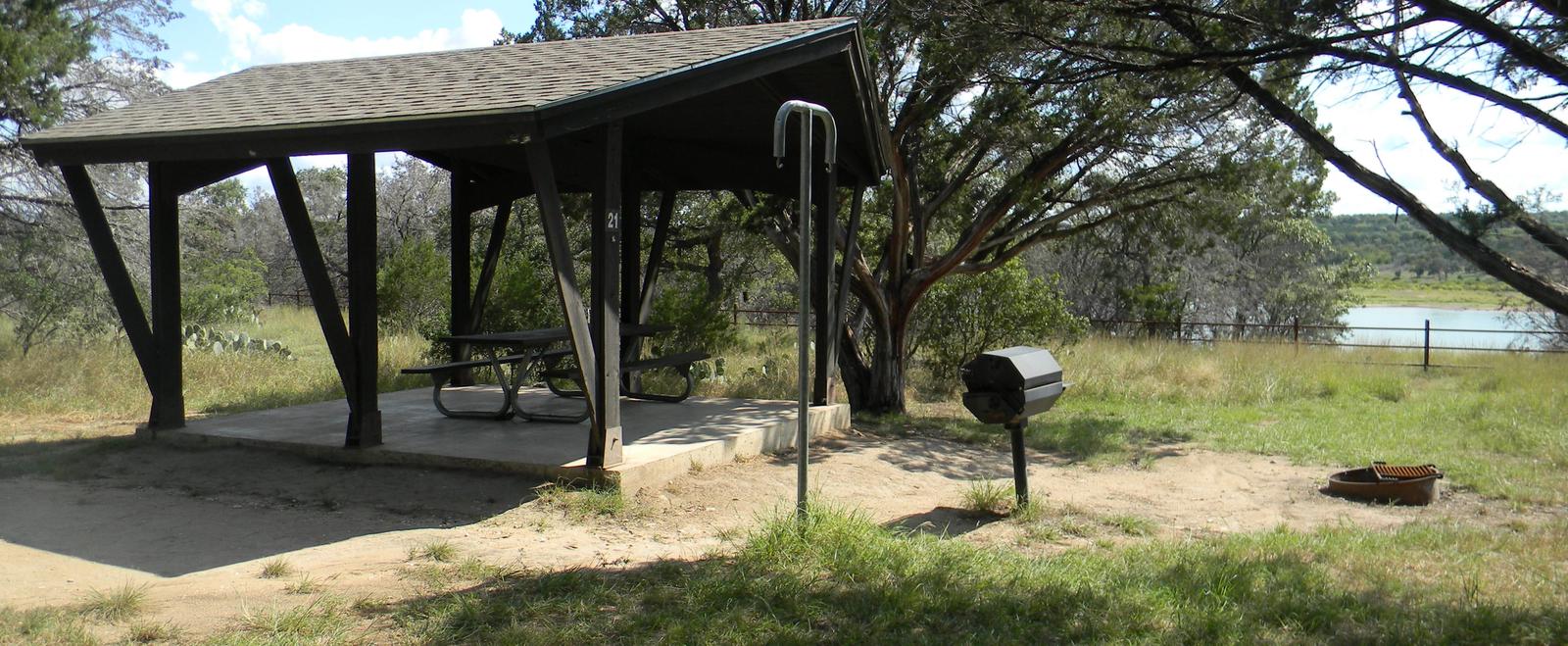 A photo of facility RUSSELL PARK with Picnic Table, Fire Pit, Lantern Pole, Lean To / Shelter