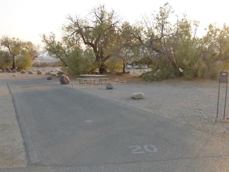 Furnace Creek Campground standard nonelectric site #20 with picnic table and fire ring.