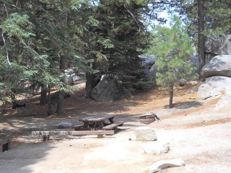 Boulder Basin campsite 15 with picnic table, fire pit and parking area.