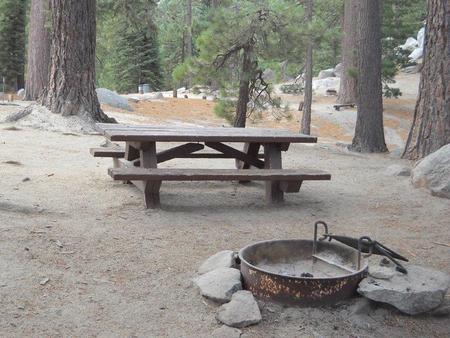 Boulder Basin campsite 30 with picnic table and fire pit.