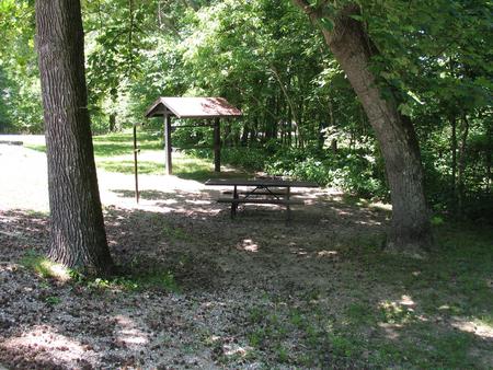 Campsite 29 showing picnic table, lantern post, food shelter and fire ring.Campsite 29