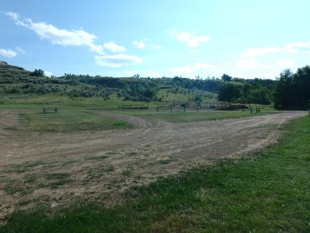 Looking at campsite toward the west. There are four corrals located on the east side of the site with dirt driveway