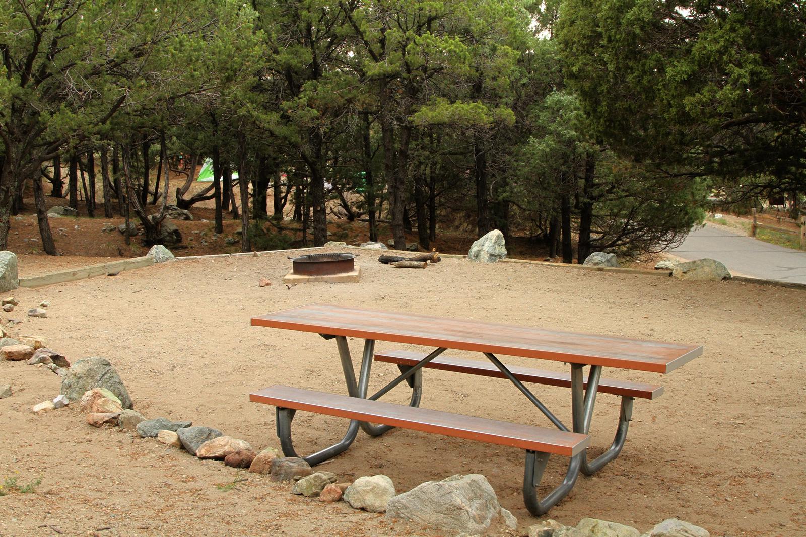 Back view of Site #15 tent pad, picnic table, and fire ringSite 15, Pinon Flats Campground