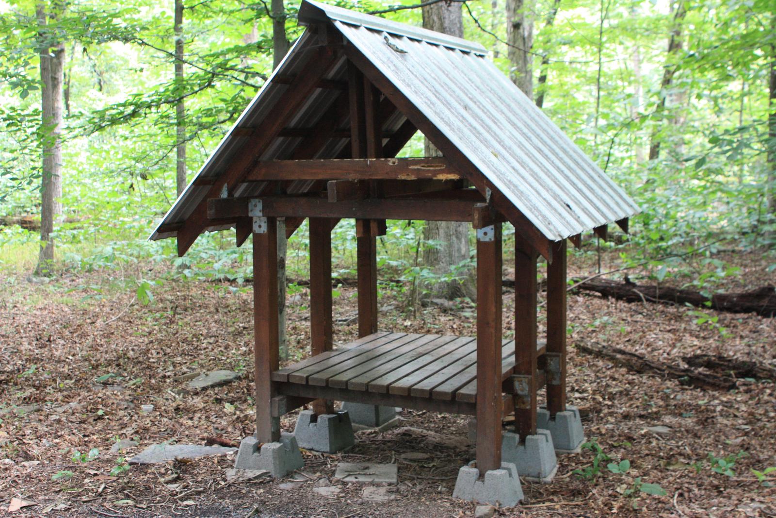 Wood ShedSmall Shed with metal roof for firewood
