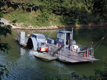 Green River Ferry transporting vehicle across the Green River. 