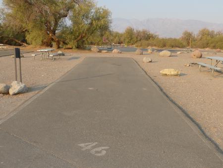 Furnace Creek Campground standard nonelectric site #46 with picnic table and fire ring.