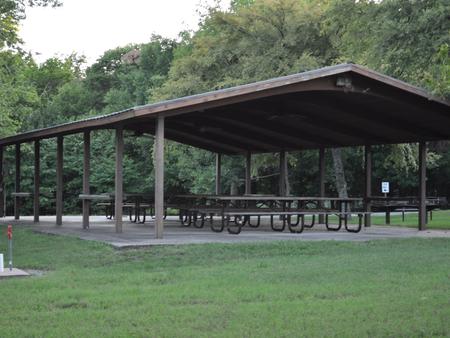 Group Day Use Shelter at Blue Bill PointCovered group picnic shelter at Blue Bill point offers 4 large picnic table, 2 large pedestal grills and 4 electrical outlets.