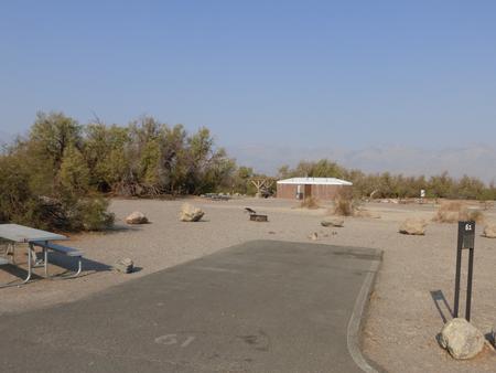 Furnace Creek Campground standard nonelectric site #61 with picnic table and fire ring.