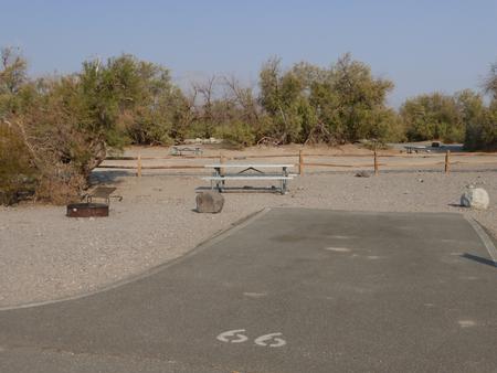 Furnace Creek Campground standard nonelectric site #66 with picnic table and fire ring.