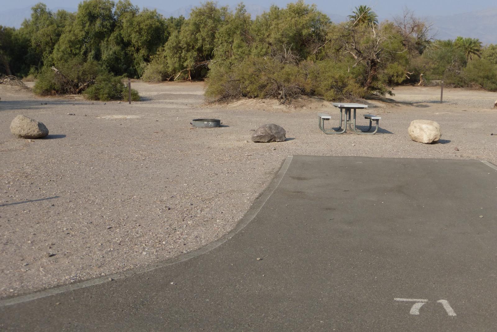 Furnace Creek Campground standard nonelectric site #71 with picnic table and fire ring.