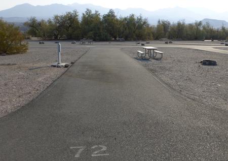 Furnace Creek Campground full hookup site #72. Water, sewer, and 30/50 amp electric connection. One fire pit and one picnic table.