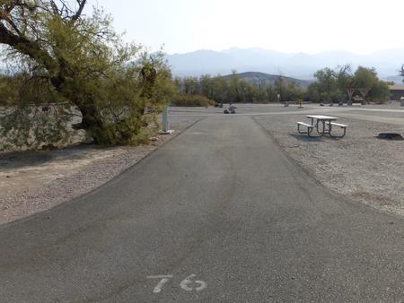 Furnace Creek Campground full hookup site #76. Water, sewer, and 30/50 amp electric connection. One fire pit and one picnic table.
