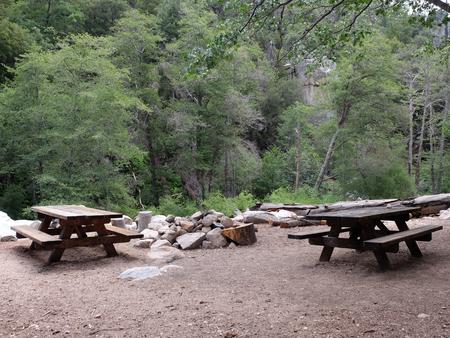 Picnic tables with fire pit.