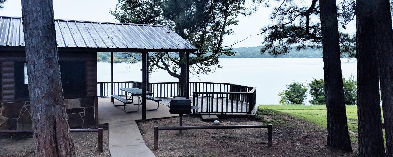 Screened shelter in Clear Springs Campground overlooking Wright Patman Lake.