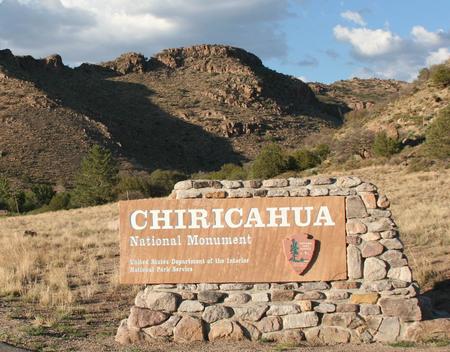 Entrance sign at the mouth of Bonita Canyon for Chiricahua National Monument. Entrance to Bonita Canyon and Chiricahua National Monument.