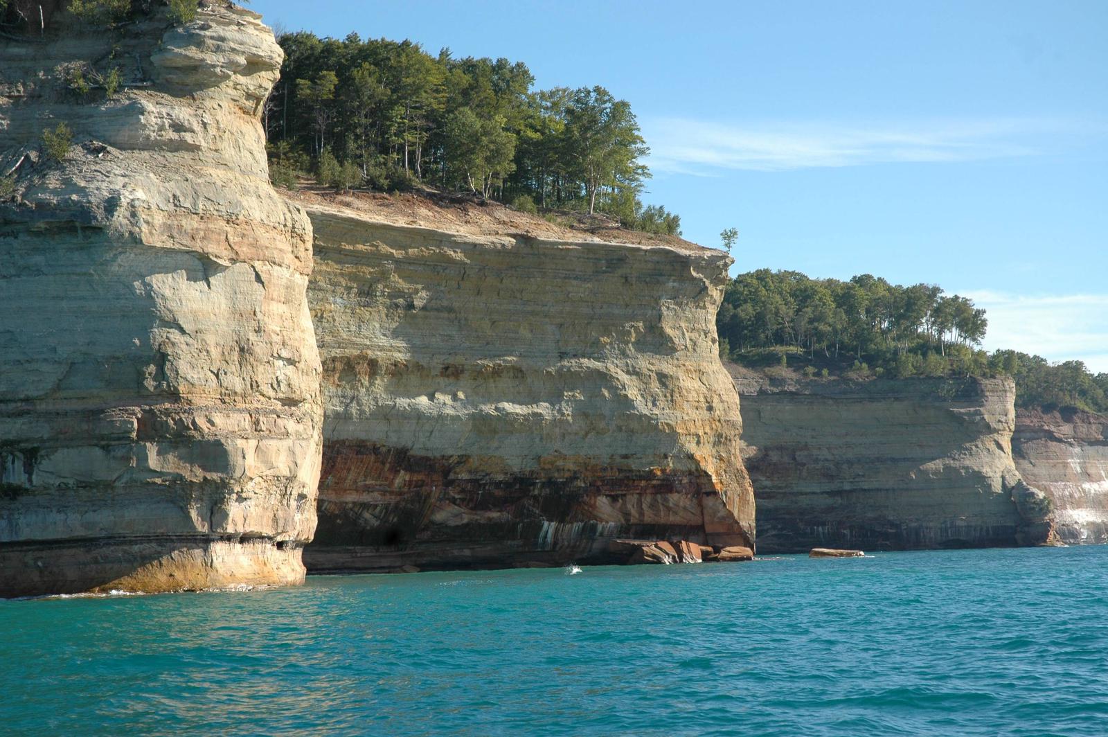 A water view of Pictured Rocks National LakeshorePhoto of Battle Ship Row rock formation