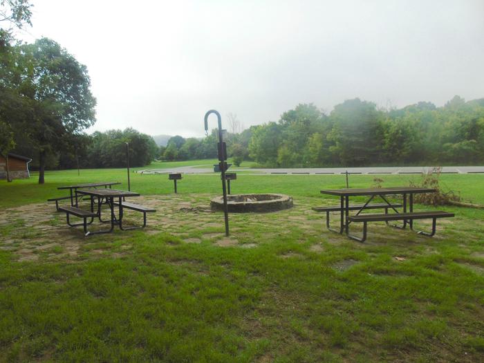 Tyler Bend Group Site 3-1Group Site #3: Three picnic tables; two lantern holders; two charcoal cooking stands; one large fire pit.