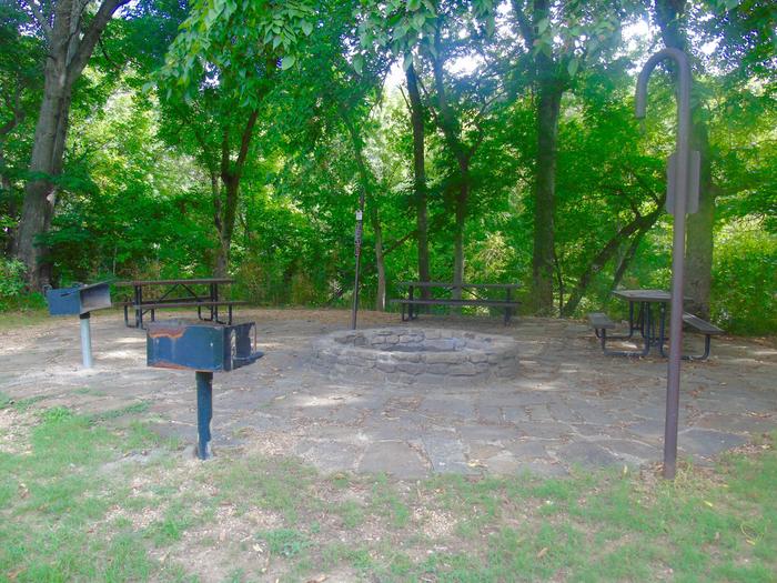 Tyler Bend Group Site 5-1Group Site #5: Three picnic tables; two lantern holders; two charcoal cooking stands; one large fire pit.