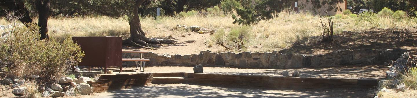 Wide view of Site #25 parking pad, stairs, tent site, bear box and picnic table.Site #25, Pinon Flats Campground