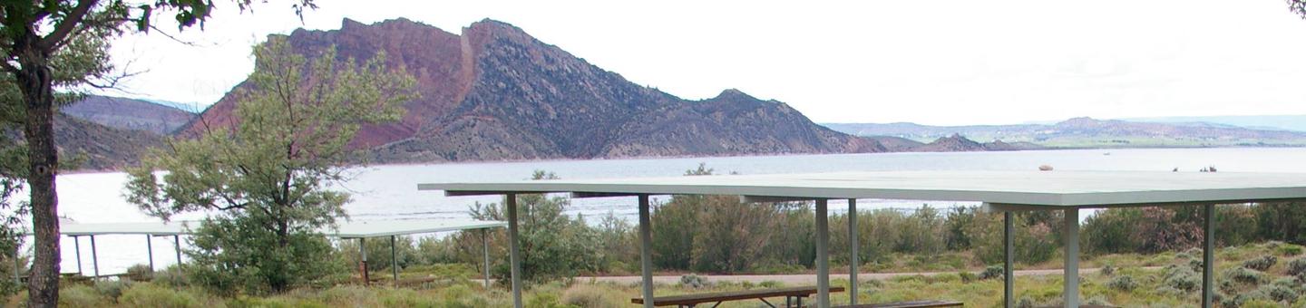 Pavillion with lake and mountain in the background.Antelope Campground