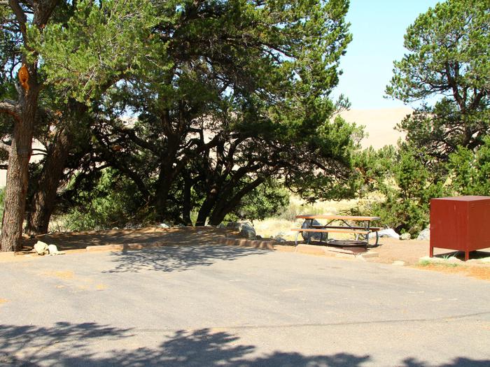 View of Site #28 parking pad, designated tent pad, picnic table, fire ring, and bear box.Site #28, Pinon Flats Campground