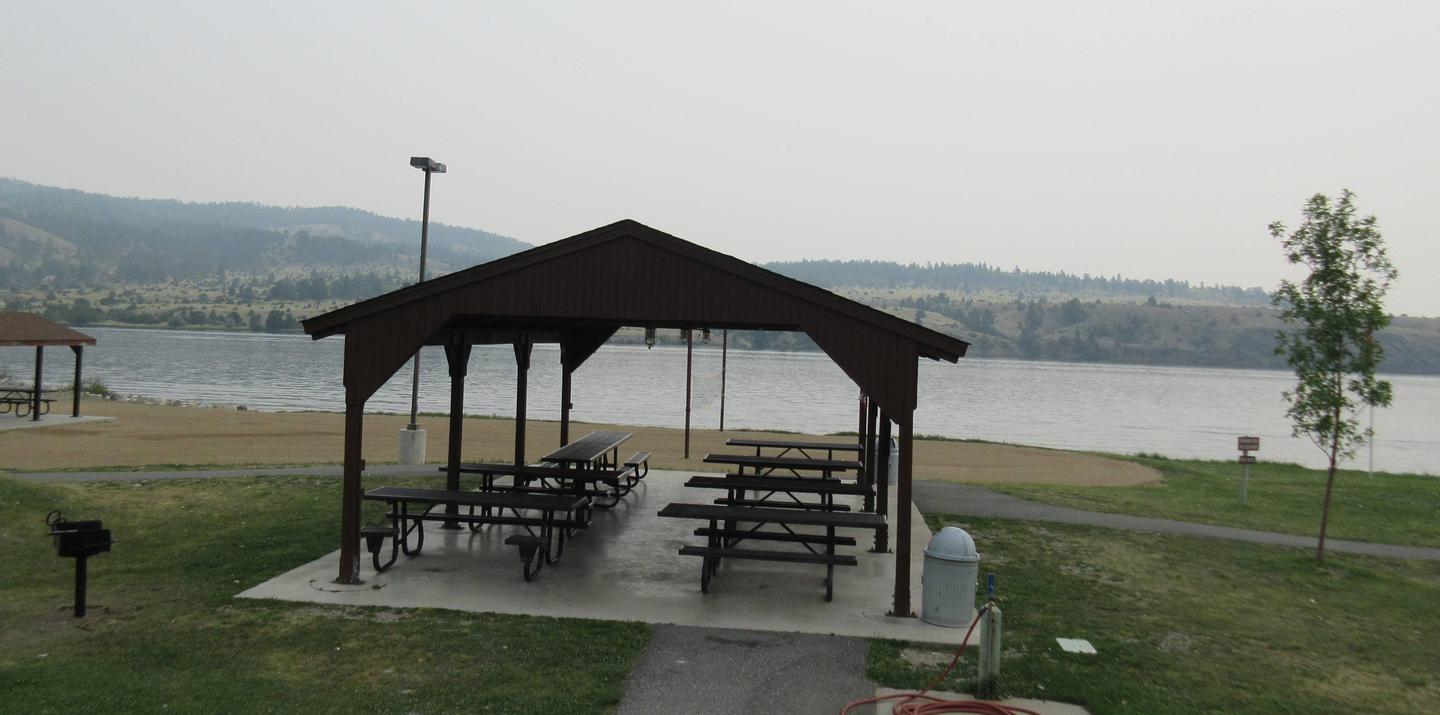 Group ramada with Hauser Lake in the background. Grill available at group ramada.Group ramada at Clark's Bay Day Use Site