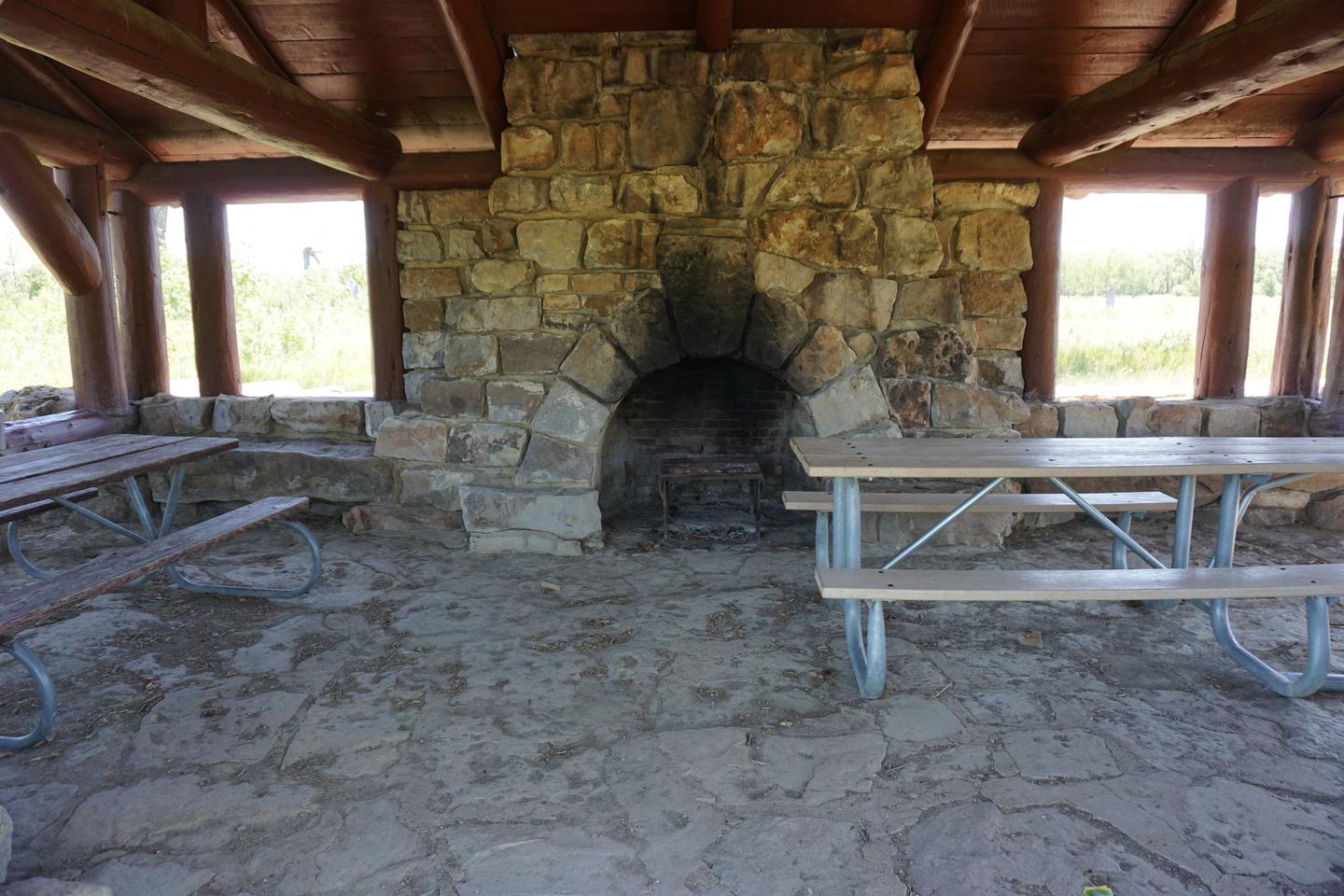 Fire place in a covered shelter. Covered shelter for the site. 