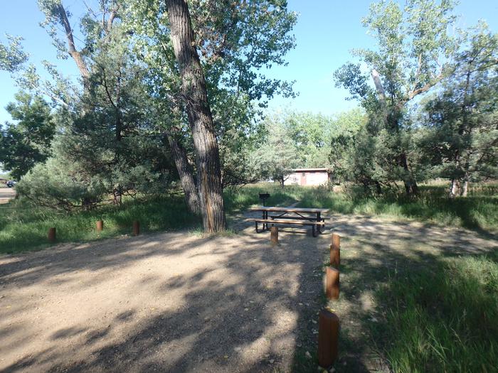 Site 69, backin site. The picnic table and grill are located behind the site. It is close to the bathroom.Site 69. 