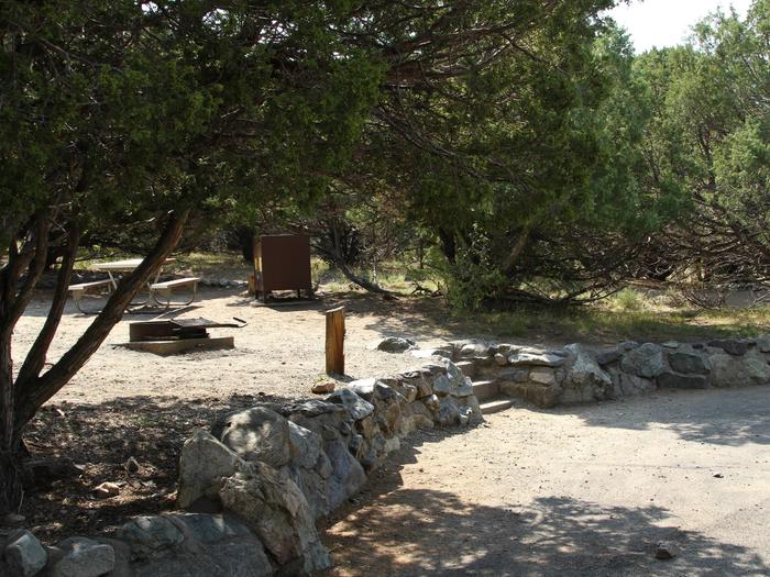 View of Site #52 parallel parking area and tent site, with fire ring, bear box, and picnic table.Site #52, Pinon Flats Campground