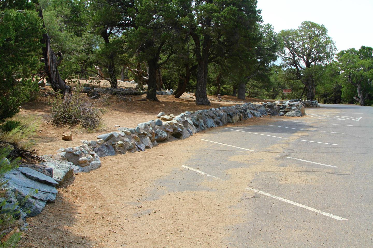 View of Group Site "A" parking area. There is room for several cars. Utility trailers are allowed in parking spaces, but not campers or recreational trailers.Group Site A, Pinon Flats Campground