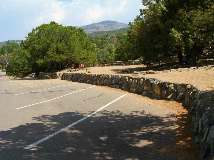 View of Group Site "B" parking area. Parking area can accommodate several vehicles and allows for utility trailers. Campers and recreational trailers and vehicles are not allowed.Group Site B, Pinon Flats Campground