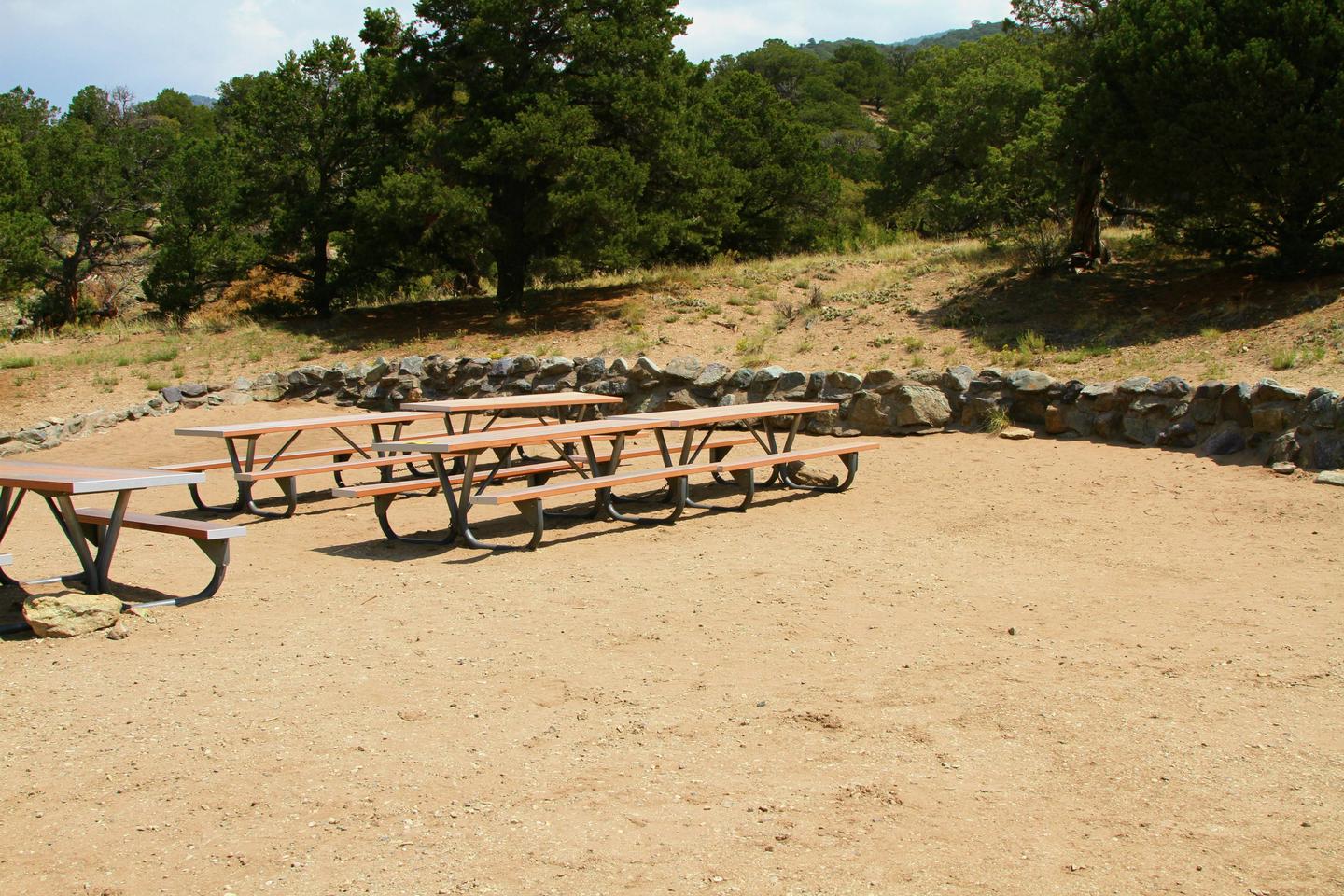 View of inside Group Site "C" tent area with picnic tables.Group Site C, Pinon Flats Campground