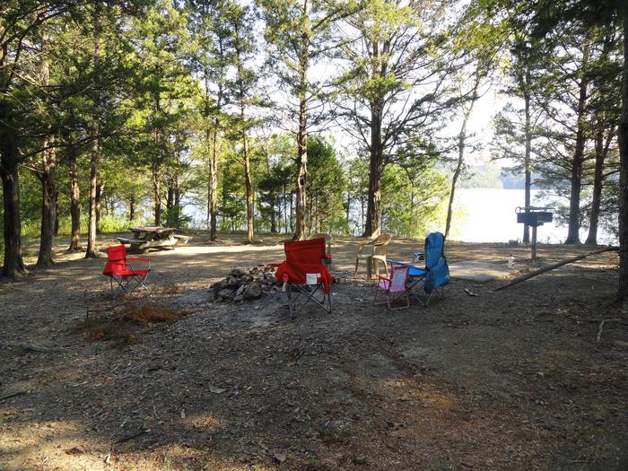 27 County Line Island colorful lawn chairs around a campfire ring27 County Line Island