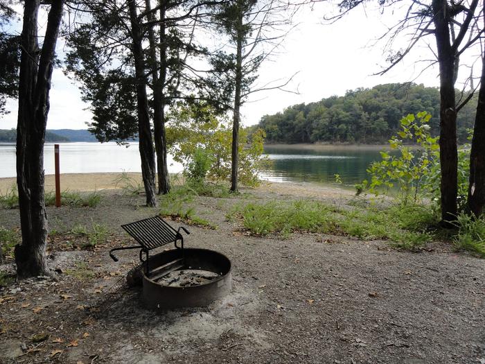 15 Sherman Hollow campfire ring with lake in background15 Sherman Hollow