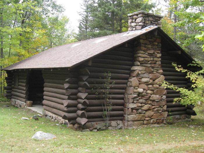 Picture of log buildingFenske Lake CCC era picnic pavilion. Pavilion is available for day-use on a first come basis.  Pavilion contains picnic tables and fireplace.