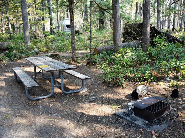 Picnic table and tent areaView of campsite