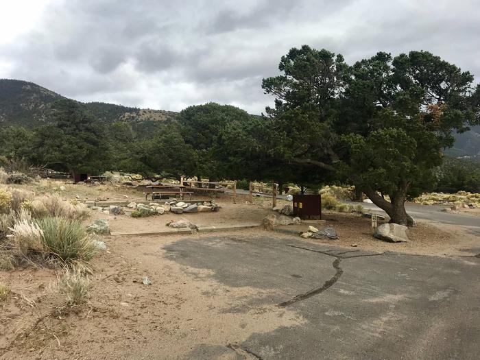 View of Site #37 parking pad and designated tent site. Site is partially fenced.Site #37, Pinon Flats Campground