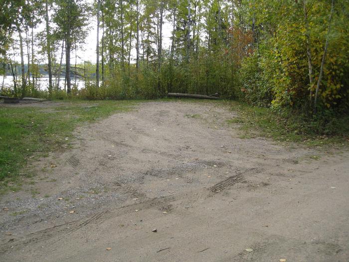 Picture of camping spur.Typical back-in campsite.  Site provides direct access to Birch Lake.