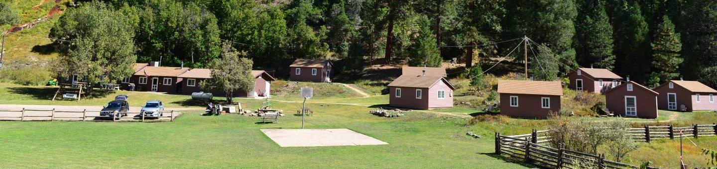 View of site showing all common areas and cabinsBig Springs Cabin Site is nestled in the Ponderosa Pines on the Kaibab National Forest near the north rim of the Grand Canyon. 