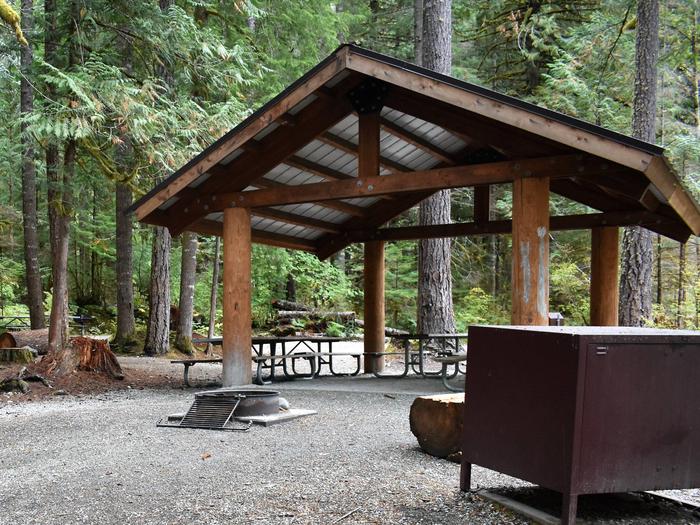 Shelter, fire rings, picnic tables, and food-lockersView of campsite