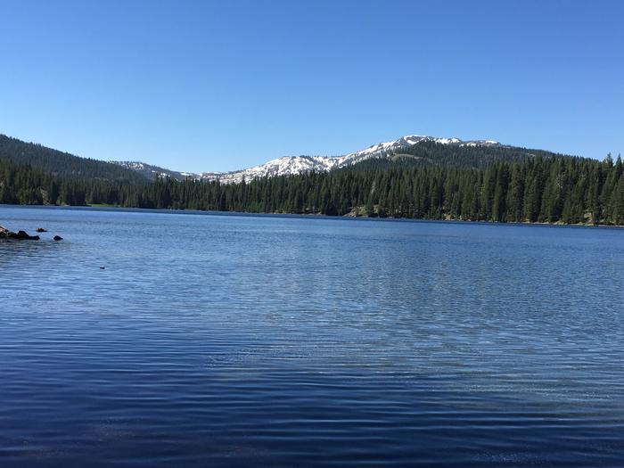 Jackson Meadows ReservoirEarly season, snow covered mountains.