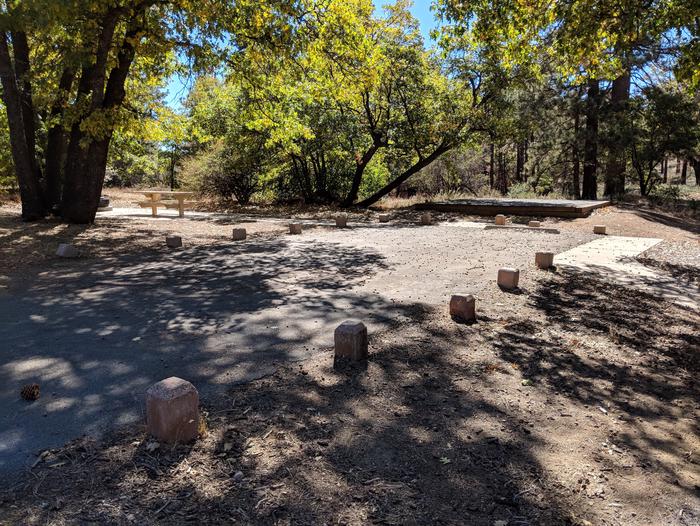 Burnt Rancheria Campground Site #44 featuring entrance to the wooded site and picnic table.Burnt Rancheria Campground Site #44 featuring entrance to the wooded site and picnic table.
