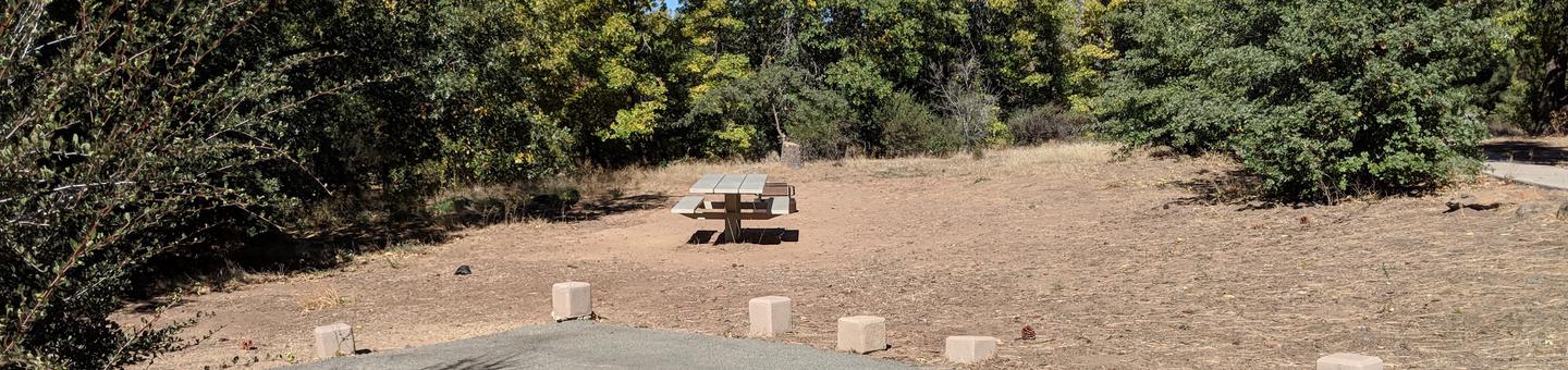 Burnt Rancheria Campground Site #45 featuring entrance to the wooded site and picnic table.Burnt Rancheria Campground Site #45 featuring entrance to the wooded site and picnic table.

