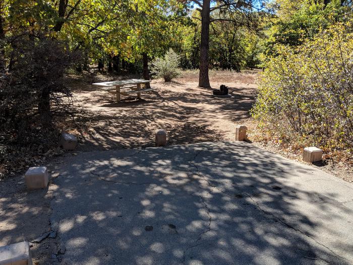 Burnt Rancheria Campground Site #55 featuring entrance to the wooded site and picnic table.Burnt Rancheria Campground Site #55 featuring entrance to the wooded site and picnic table.
