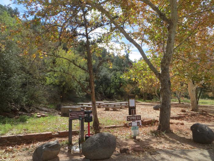 Group Site #1 at Chavez Crossing Campground featuring shaded trees and picnic and camping space.