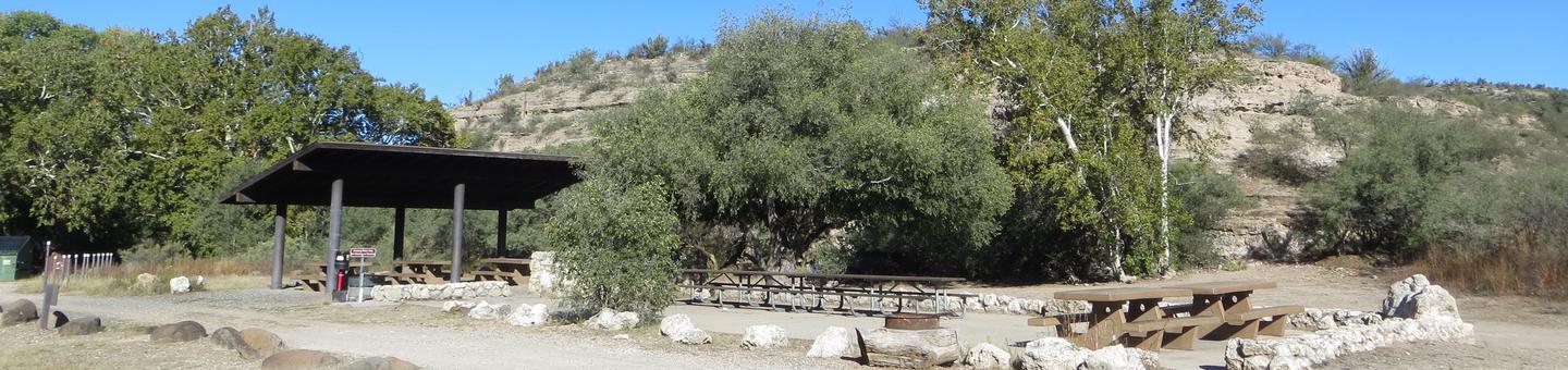 Clear Creek Campground Group Site featuring the shaded picnic area and camp space.